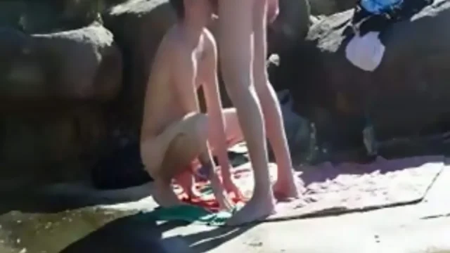 teenage guy chokes on a load of semen at the beach