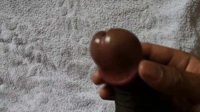 Oiling my cock head part 1