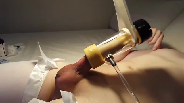 Cute femboy goes up in milking machine 3