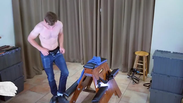 Sporty hung straight jock is tied to a spanking bench for a hard spanking