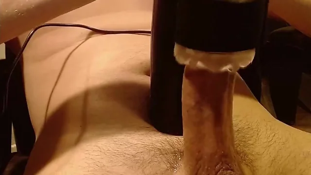 Toy stimulating my large penis to orgasmic ejaculation