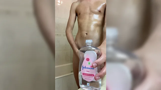 Oil-lubed twink masturbation