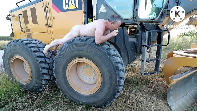 Dan gets intimate with a giant tire