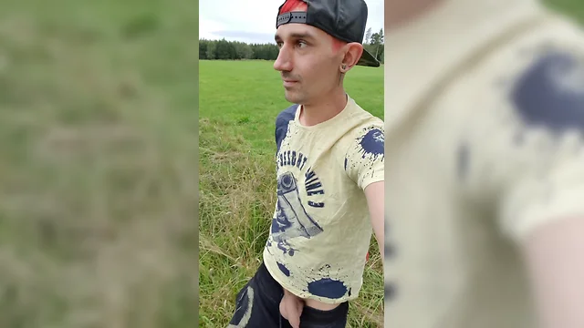 Hot man pissing on tree trunk: big cock, uncut foreskin peeing