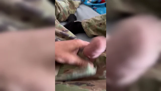 Young army solider jerks off hard and loads while strapped in jock strap