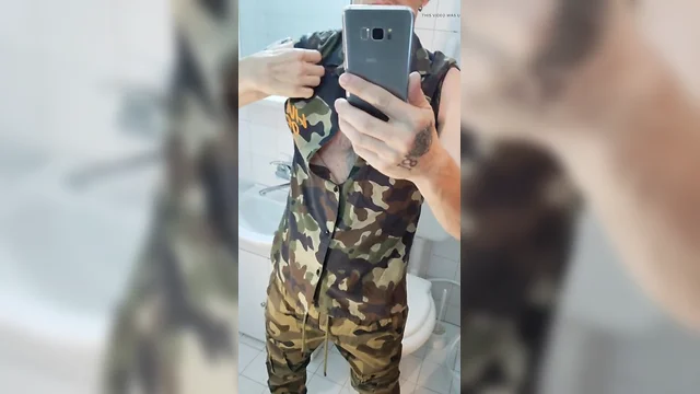 Amateur military hunk showing off in shirt and pants