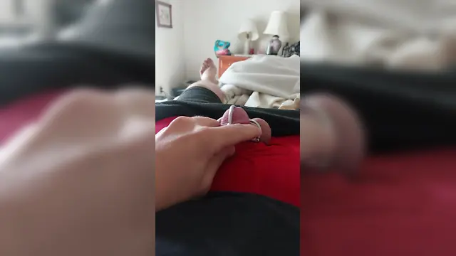 Boy in bondage chastity cage cumming while in permanent ball squeezing chastity