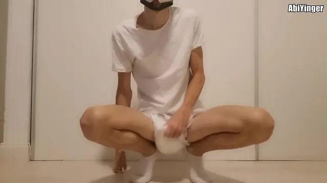 Amateur twink diaper cum: puppy jerking off and cumming in a nappy