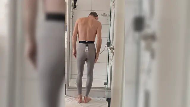 Straight male shows off naked body walking around in new sporting tights - caged, slave, chastity, horny