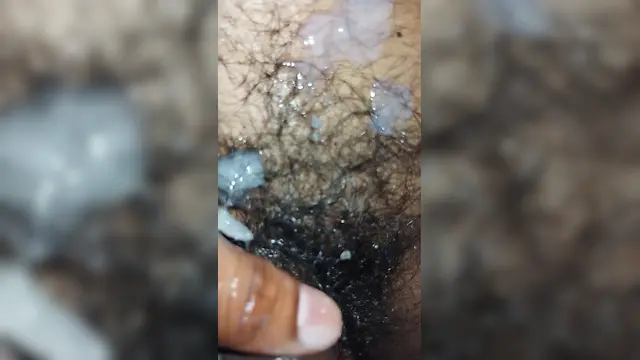 Asian boy masturbates his big black cock and plays with sperm