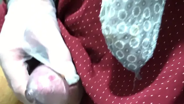Sissy tail in testicle bag and chastity cage: peeing on nylons