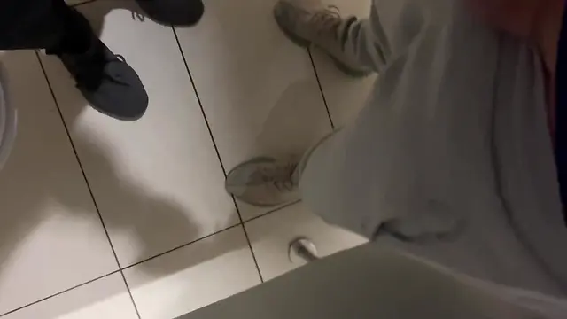 A straight guy got caught jerking his cock in the public toilet